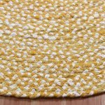 Round handmade rug yellow cotton and jute